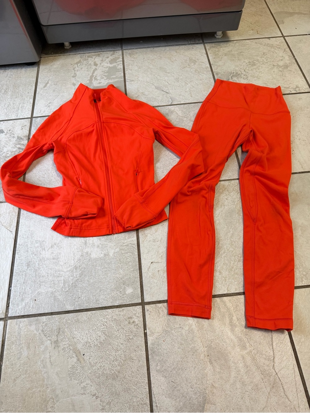 lululemon athletica Bright Orange Zip Jacket & High-Rise Leggings Set